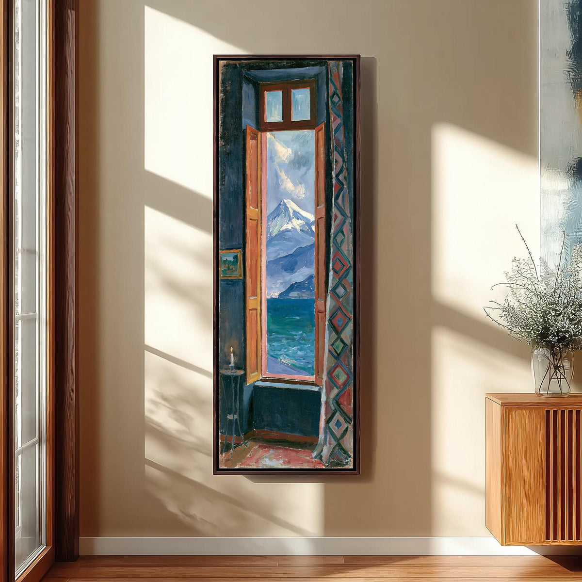 Snowy mountain and sea seen through a tall window tall skinny canvas print in a sunlit living space