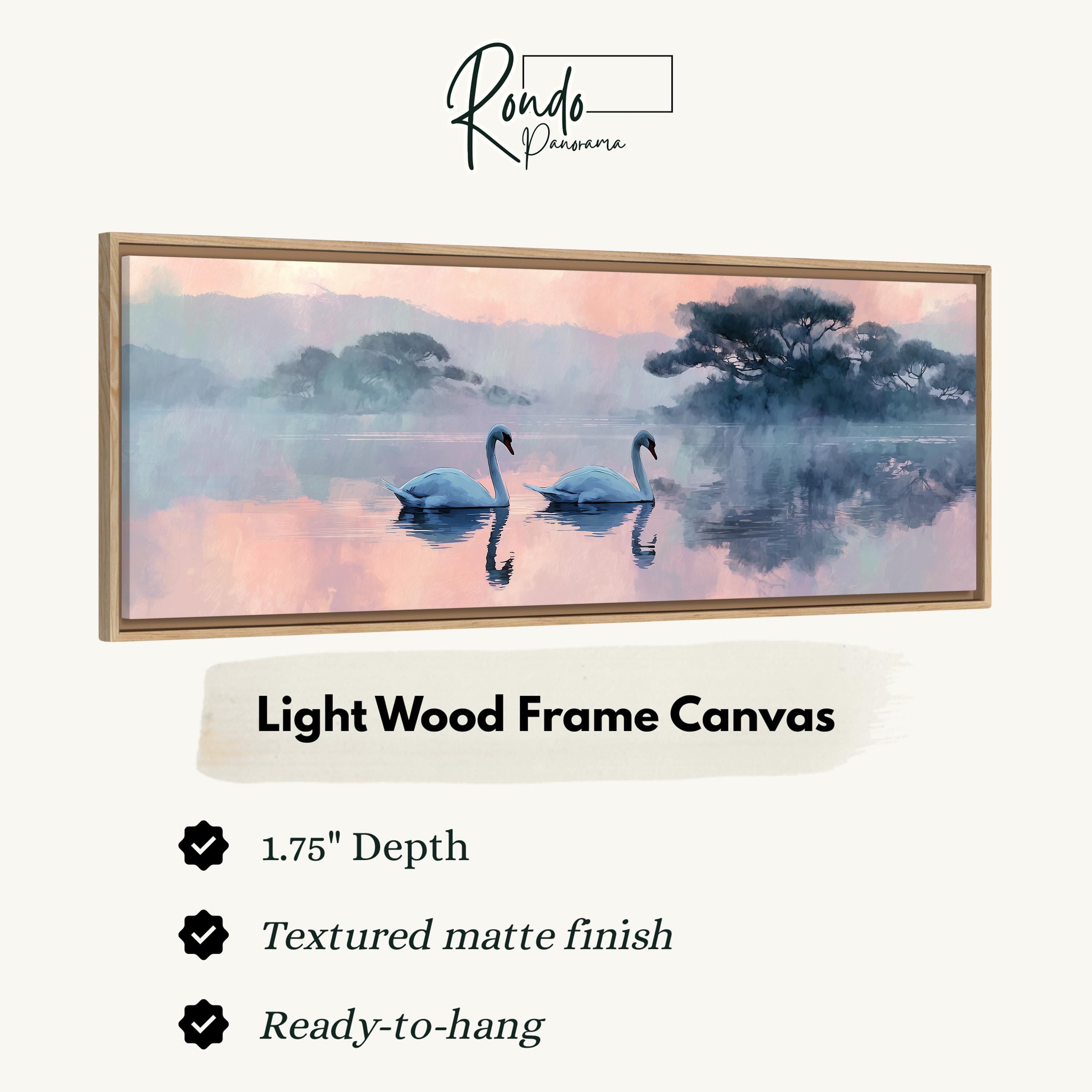 The image is a framed painting depicting two swans swimming in a misty, serene landscape.