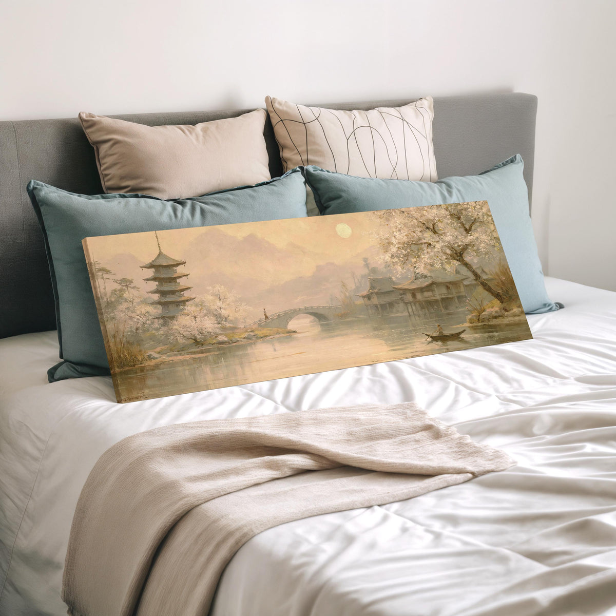 Pagoda and stone bridge at dusk wide panoramic canvas print laid on a bed to show its size