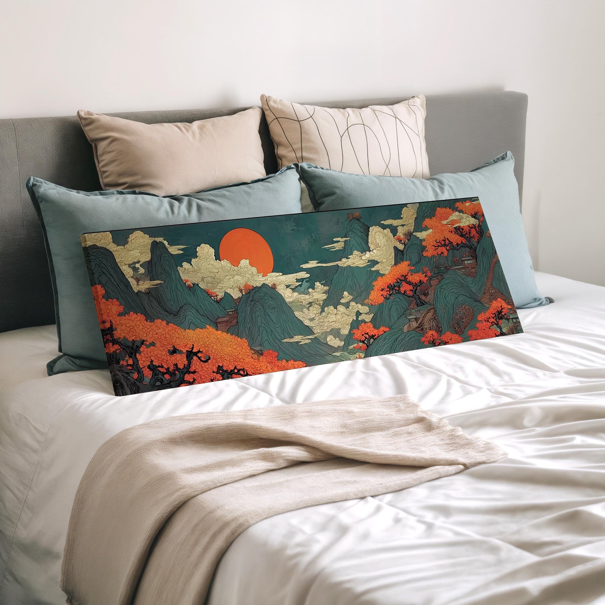 a large, colorful painting of a landscape with mountains, trees, and a sun in the sky, displayed on a bed with a white comforter and pillows.
