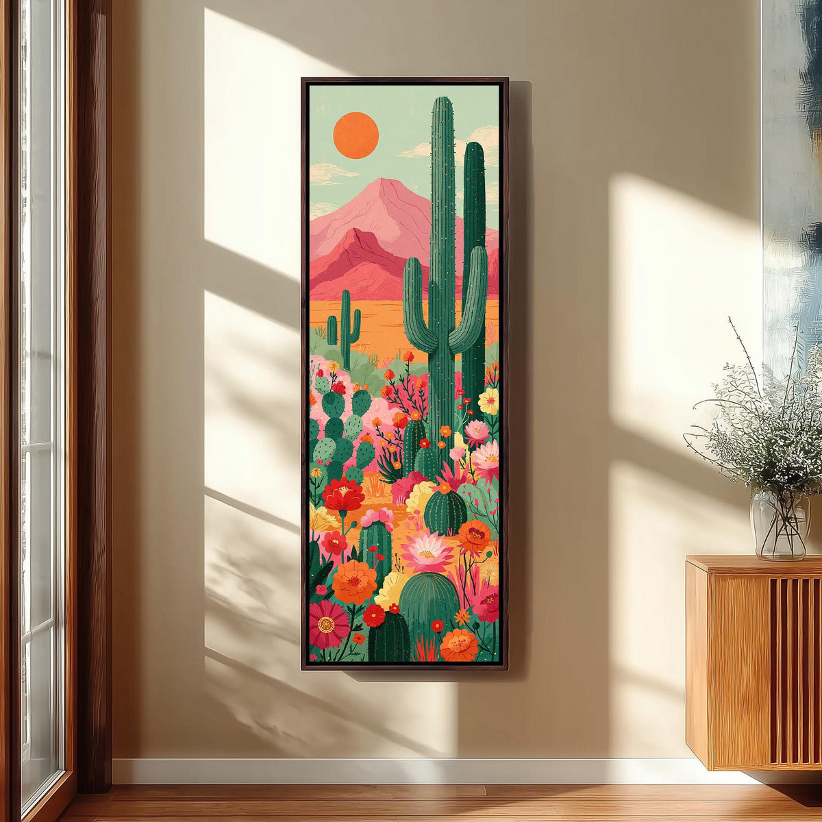 Cacti and flowers under a pink mountain long vertical canvas print in a sunlit living space