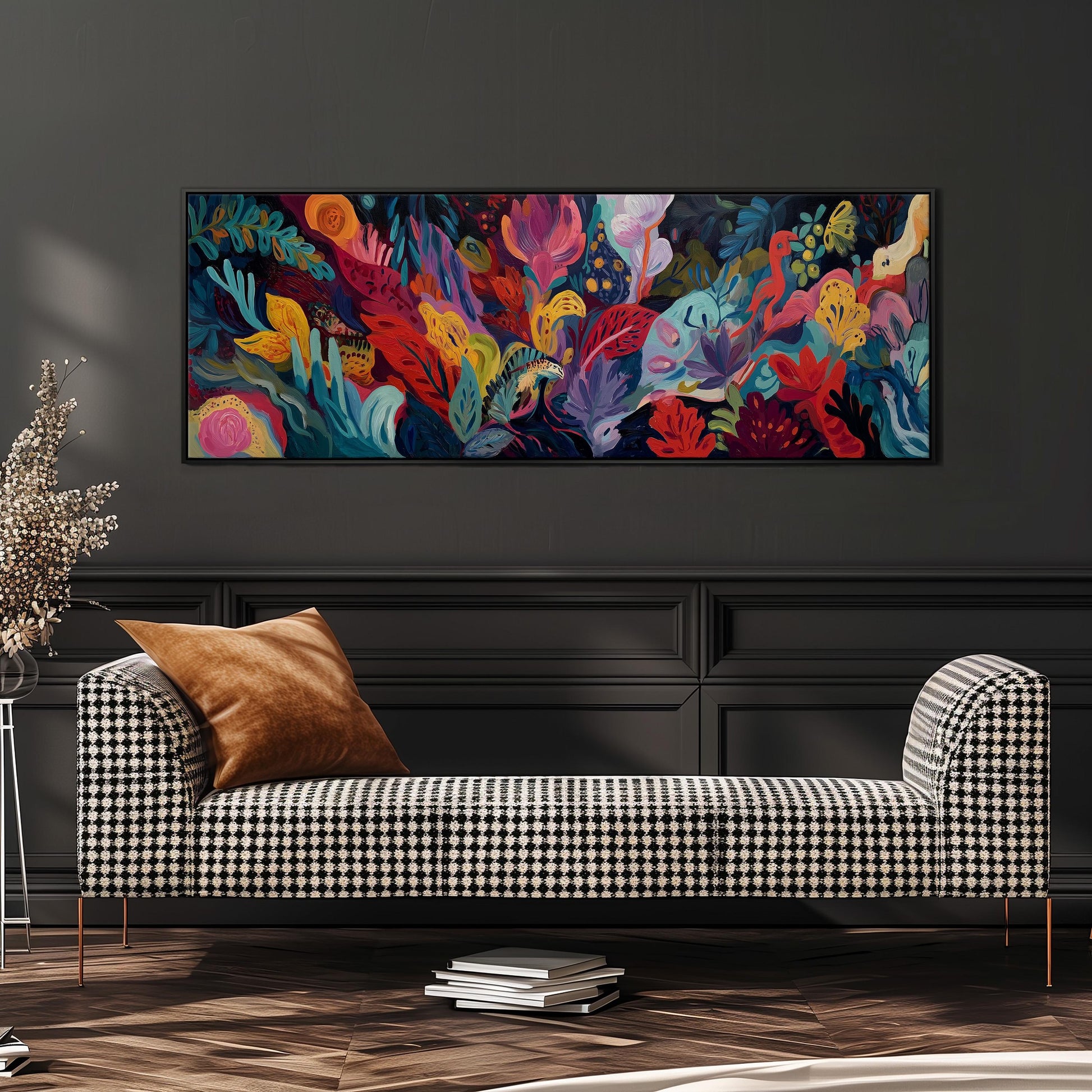 a large, colorful painting of a tropical garden hanging on a wall above a black and white checkered sofa.
