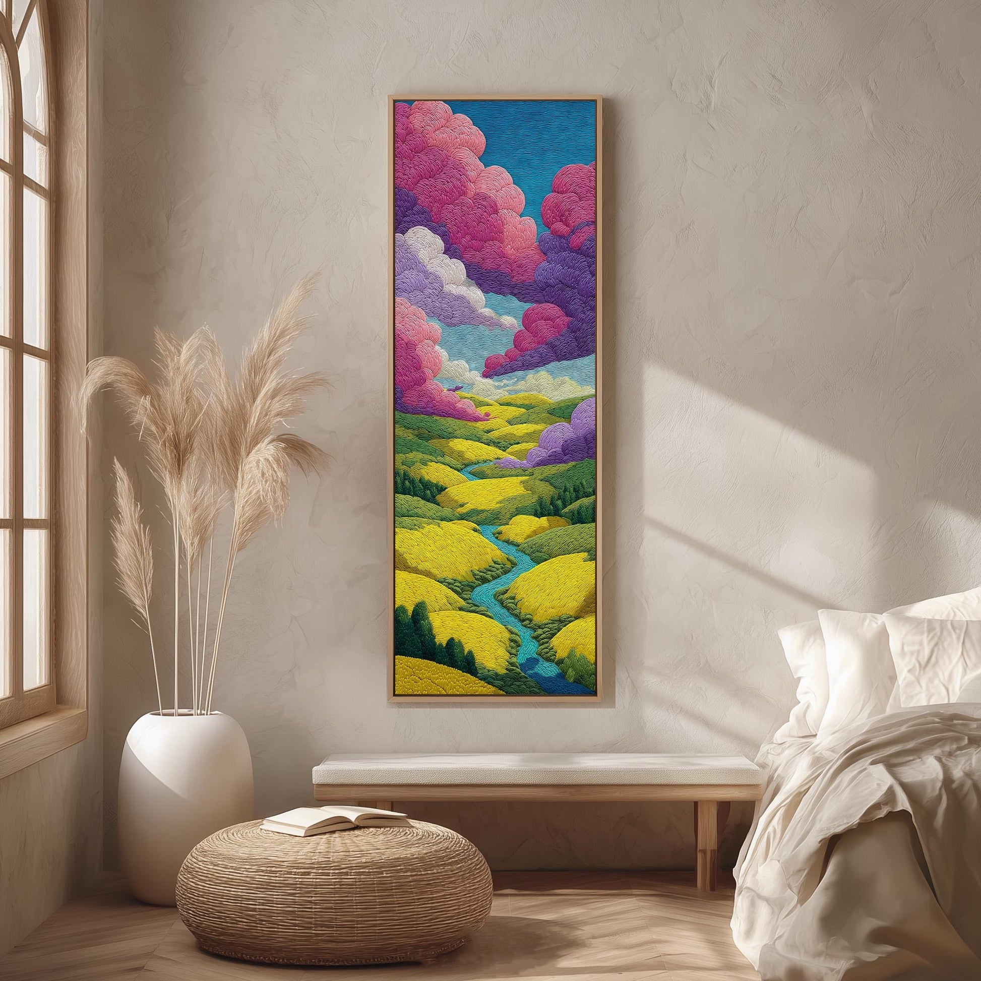 a large, colorful painting of a landscape hanging on a wall in a room with a window, a bench, and a potted plant.