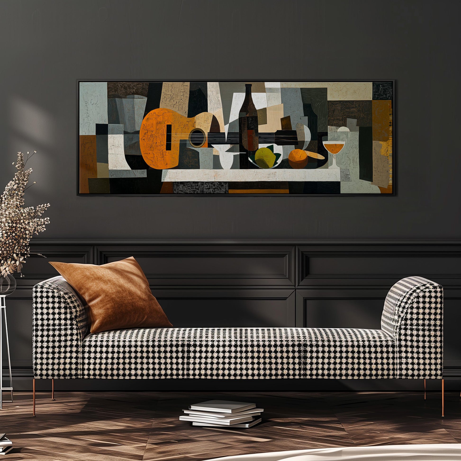 a modern living room with a black and white checkered sofa, a stack of books, and a large abstract painting on the wall.