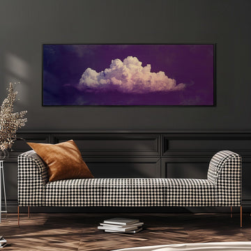 a checkered sofa with a brown throw pillow, set against a dark wall with a framed image of a cloud hanging above it.