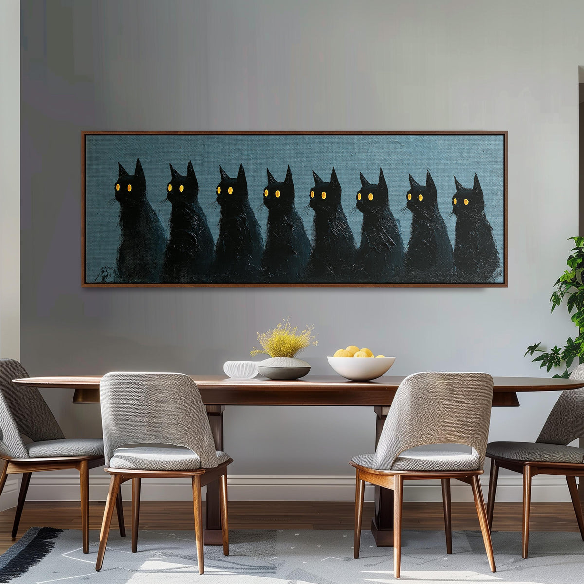 Row of black cats with glowing eyes long horizontal canvas print above a dining table