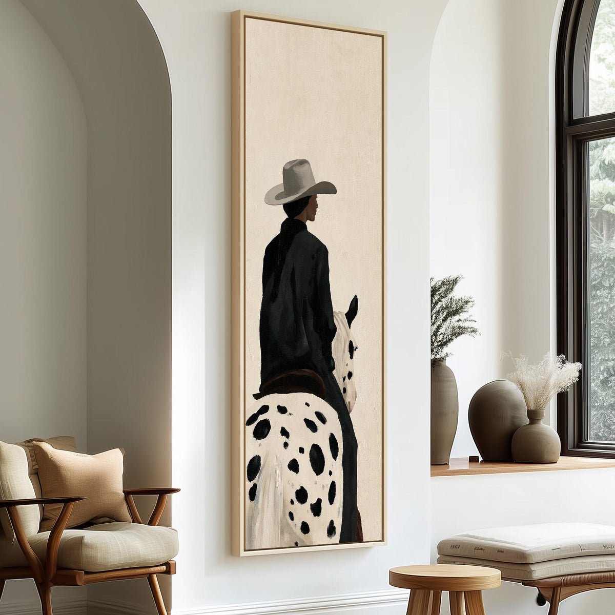 Cowgirl on a spotted appaloosa from behind tall skinny canvas print in a sunlit living space