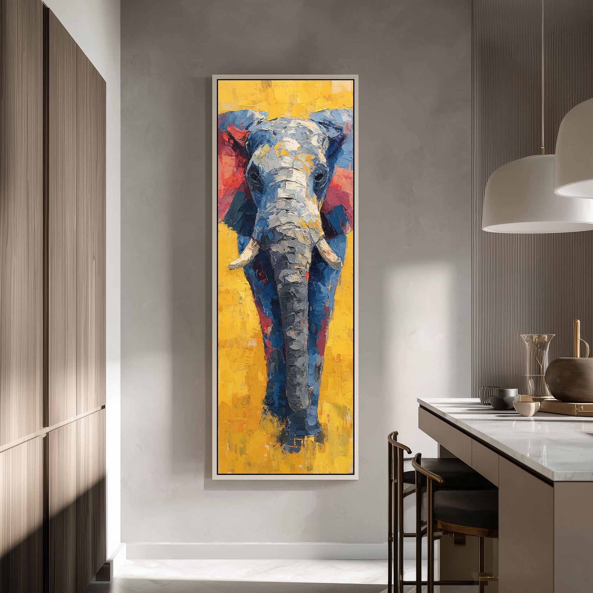 a large, vibrant painting of a blue elephant with a yellow background, hanging on a wall in a modern kitchen.