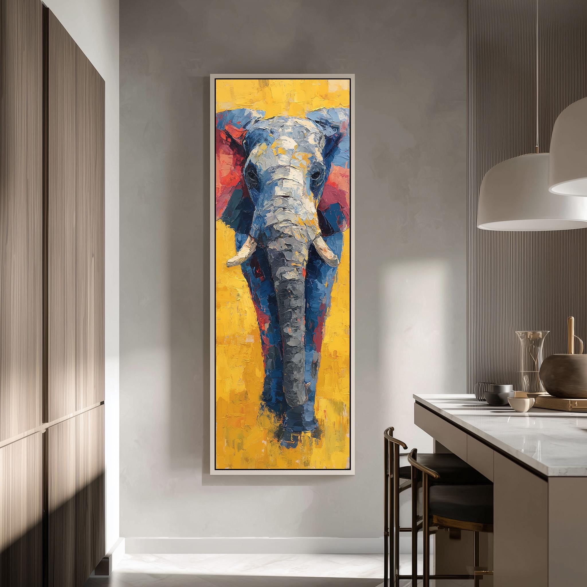 a large, vibrant painting of a blue elephant with a yellow background, hanging on a wall in a modern kitchen.