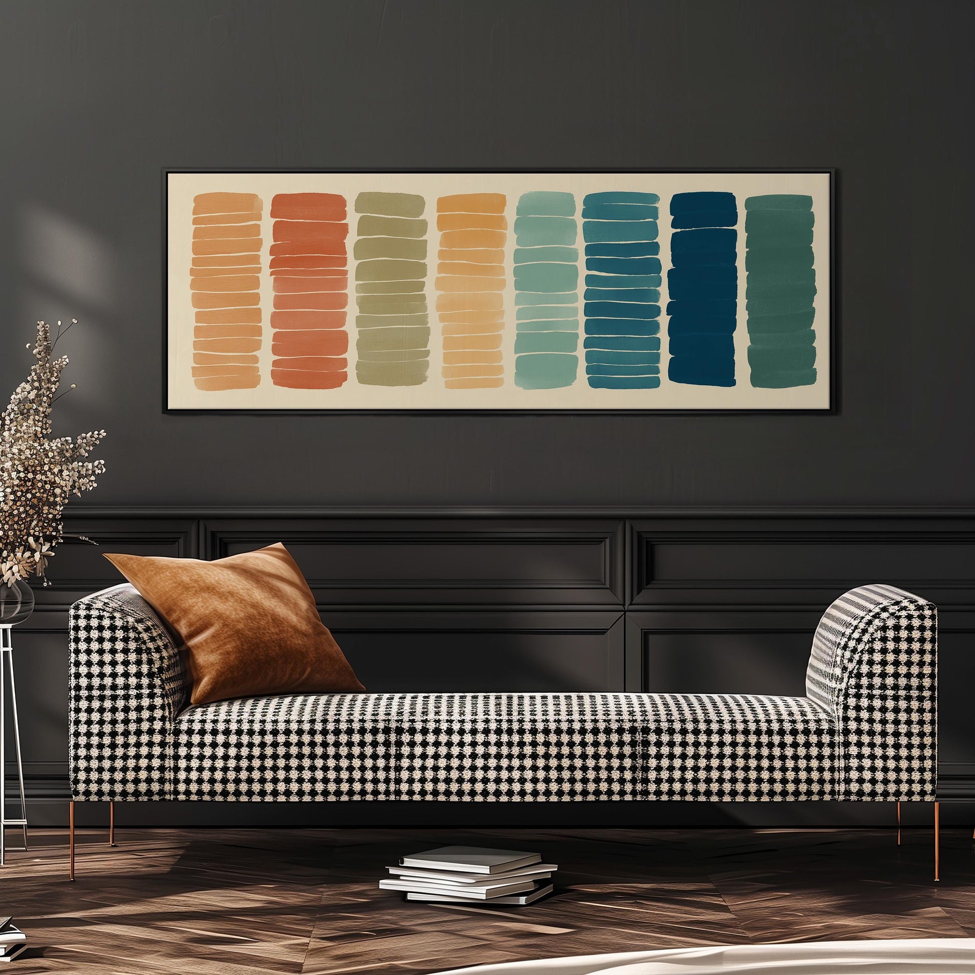 a modern living room with a black and white checkered sofa, a stack of books, and a framed abstract art piece on the wall.