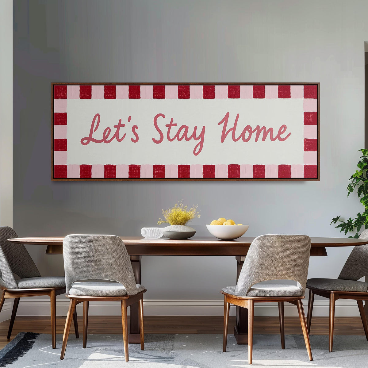 Let's stay home sign with a red checked border long horizontal canvas print above a dining table