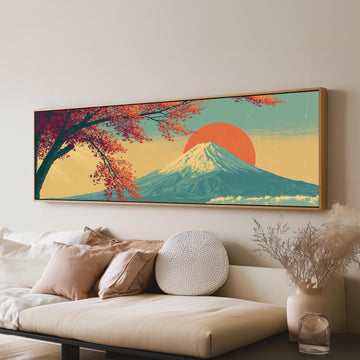 Autumn maple branch and Mount Fuji at sunset long horizontal canvas print above a sofa in a living room