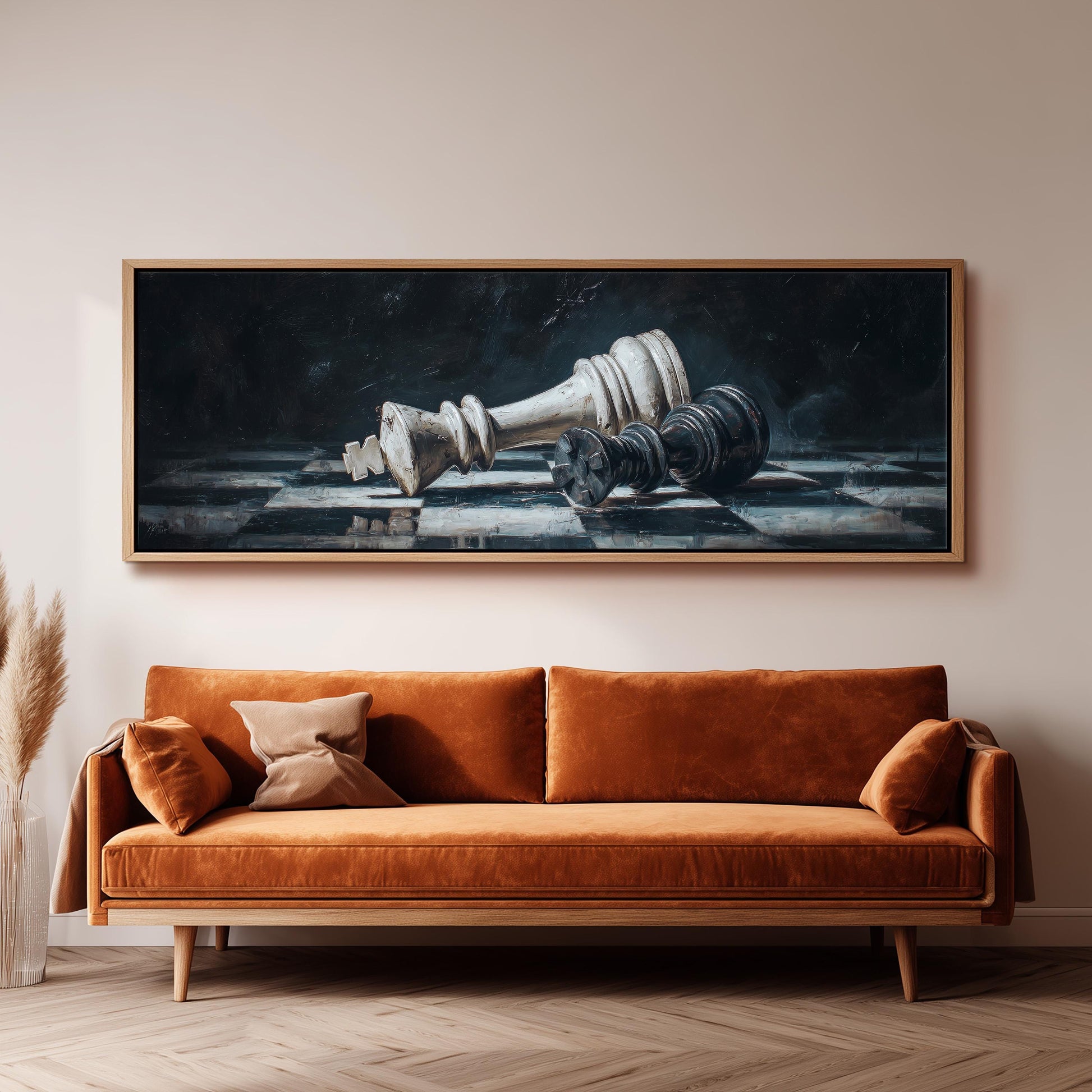 a large painting of a chess king and pieces hanging on a wall above a brown sofa.
