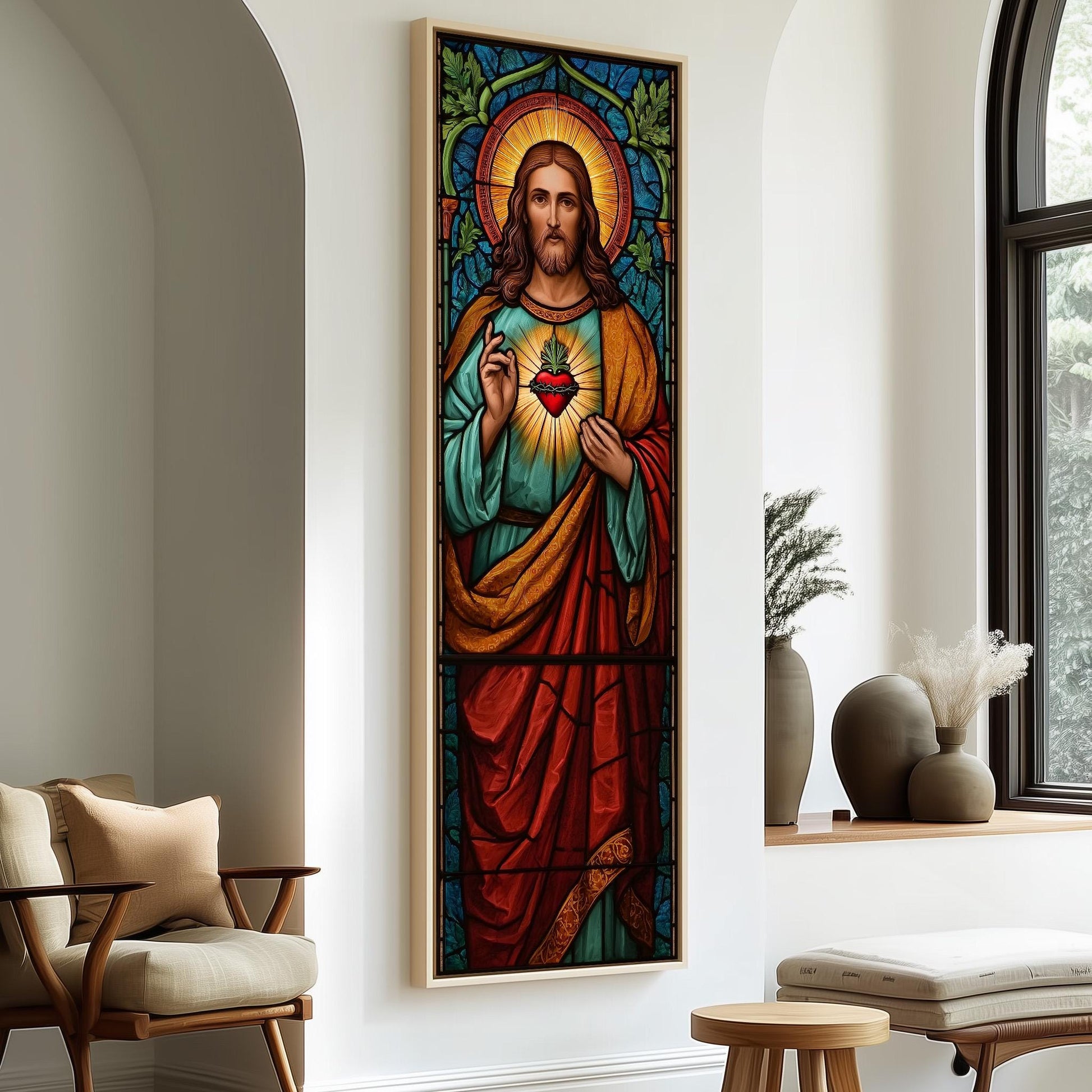 a large, colorful painting of Jesus Christ, with a stained glass-like design, hanging on a wall in a room with a window and a chair.