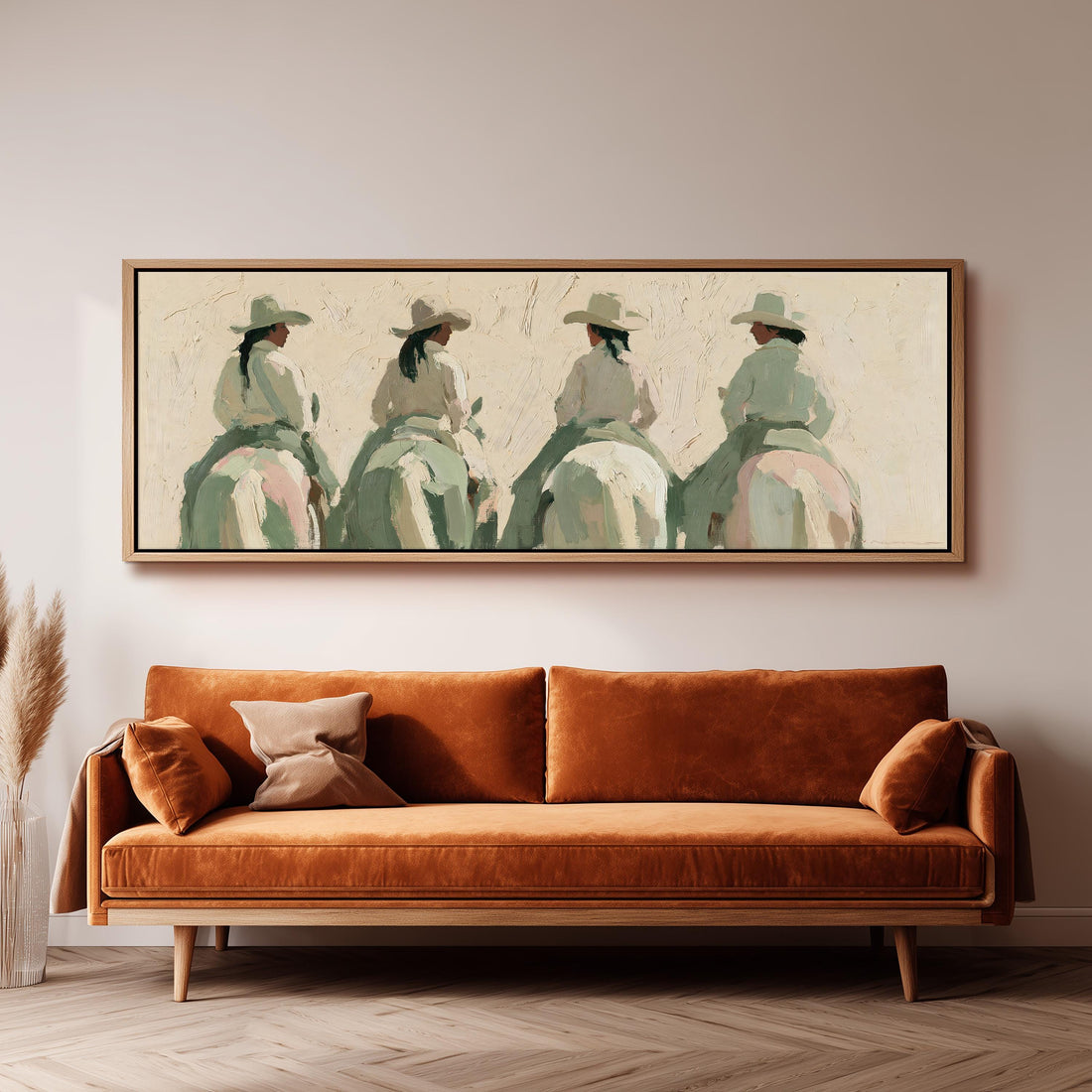 Cowgirl trail riders long horizontal canvas print above a sofa in a living room