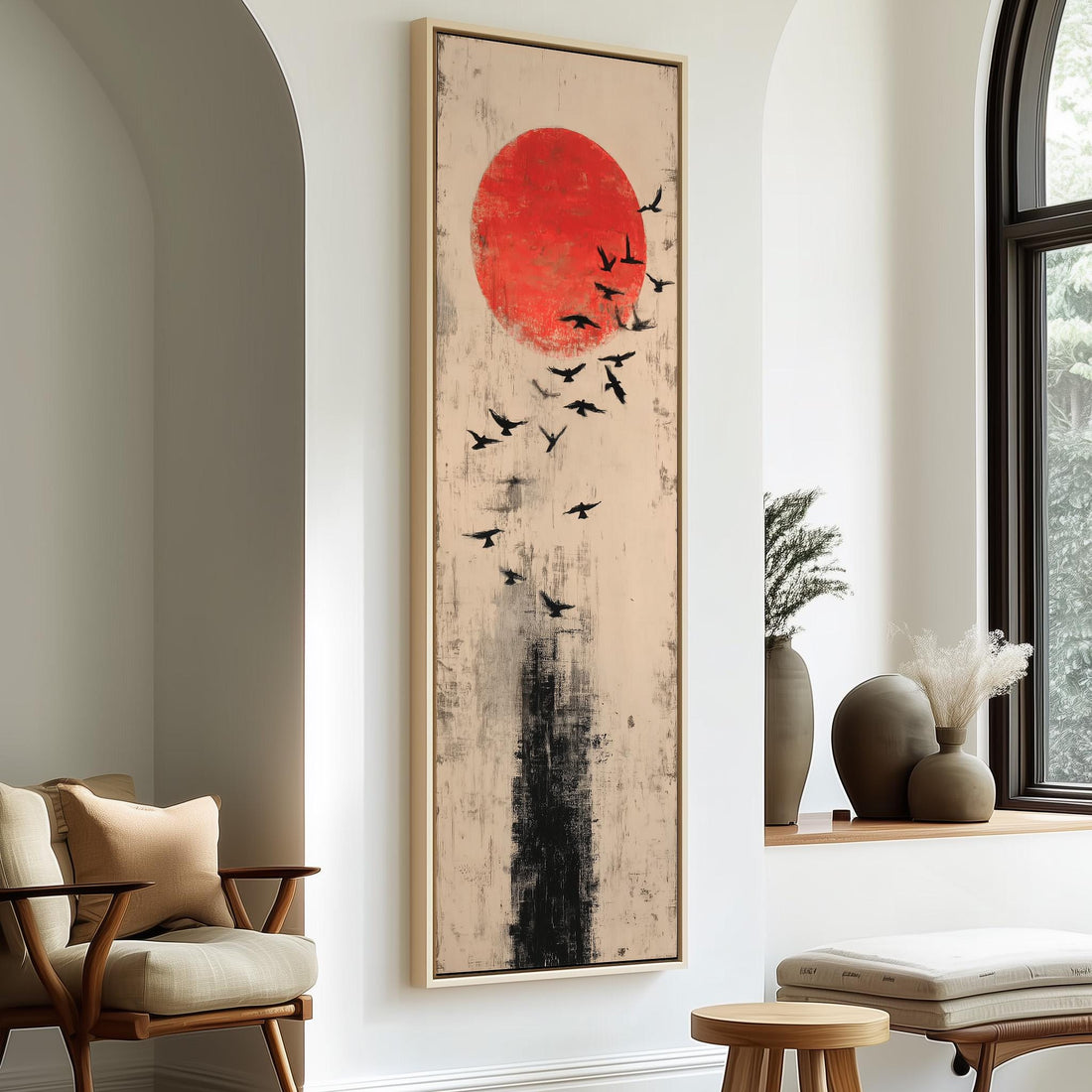 a large abstract painting hanging on a wall, depicting a flock of birds against a red background. The painting is framed and appears to be the focal point of the room.