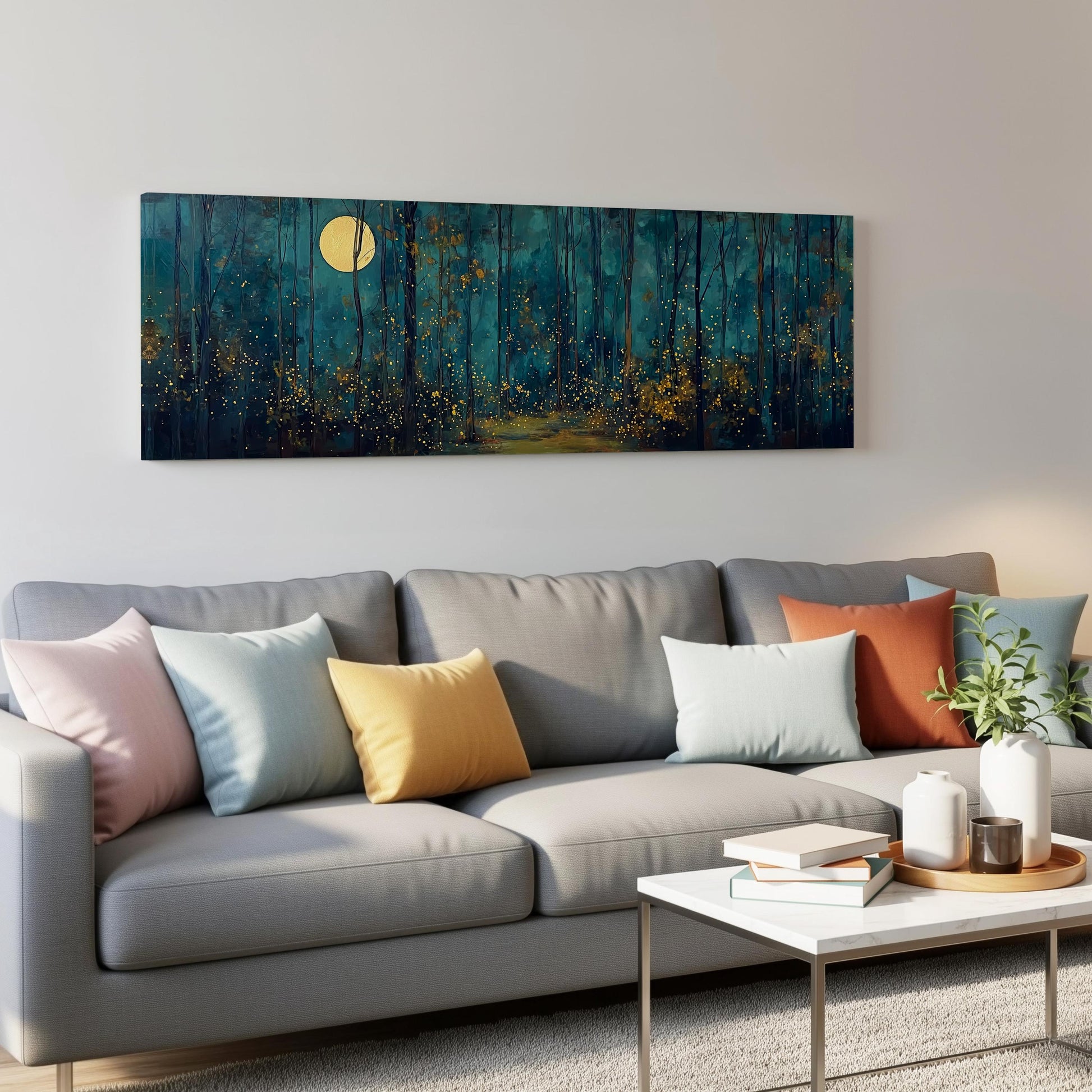 a cozy living room with a gray sofa adorned with colorful throw pillows, a white coffee table, and a large painting of a forest scene hanging on the wall above the sofa.