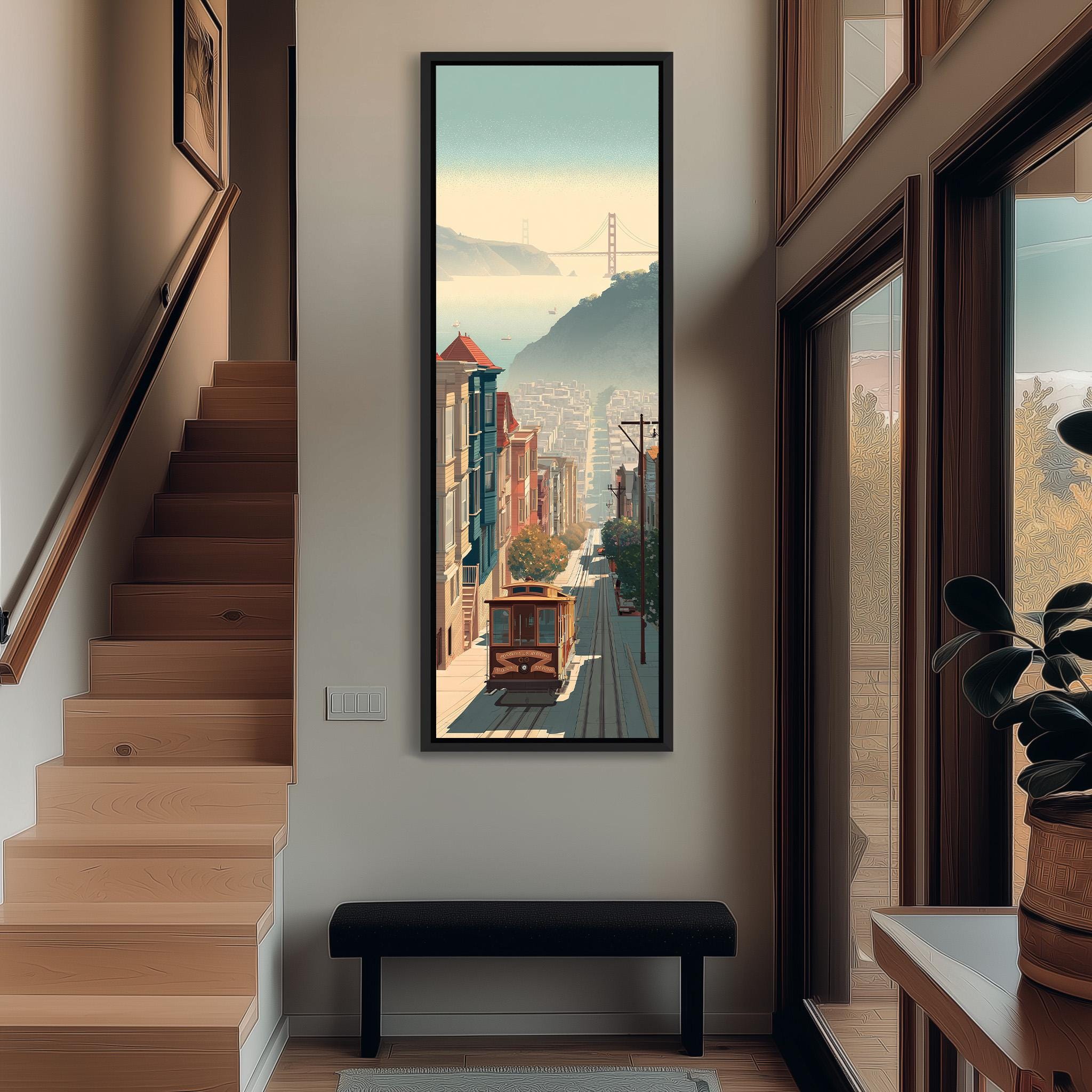 a large framed painting of a cityscape with a trolley car in the foreground, hanging on a wall above a bench.