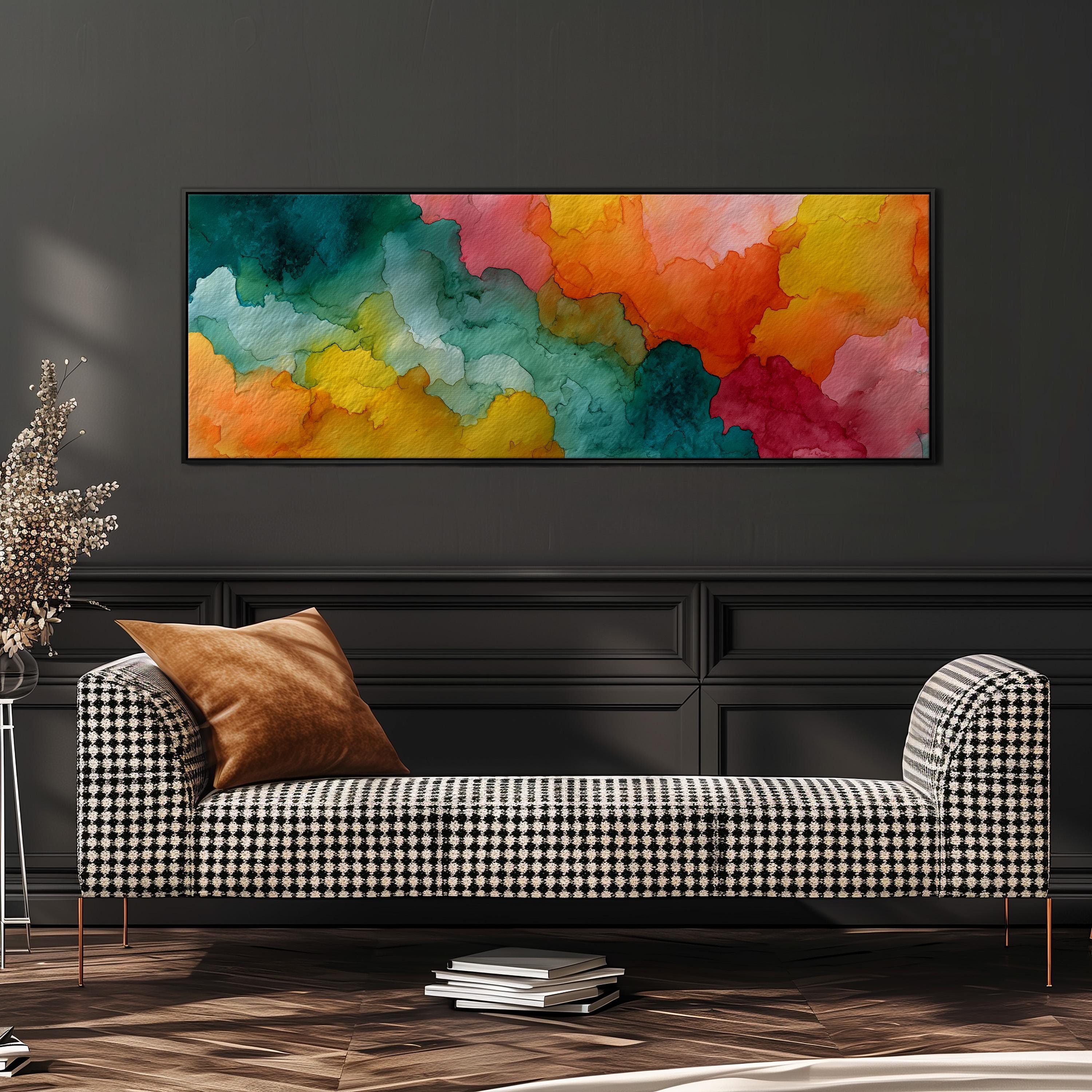 a checkered sofa with a vibrant abstract painting hanging above it on a dark wall.