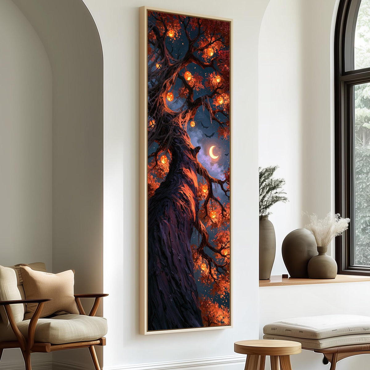 Twisted tree hung with glowing jack-o'-lanterns tall skinny canvas print in a sunlit living space