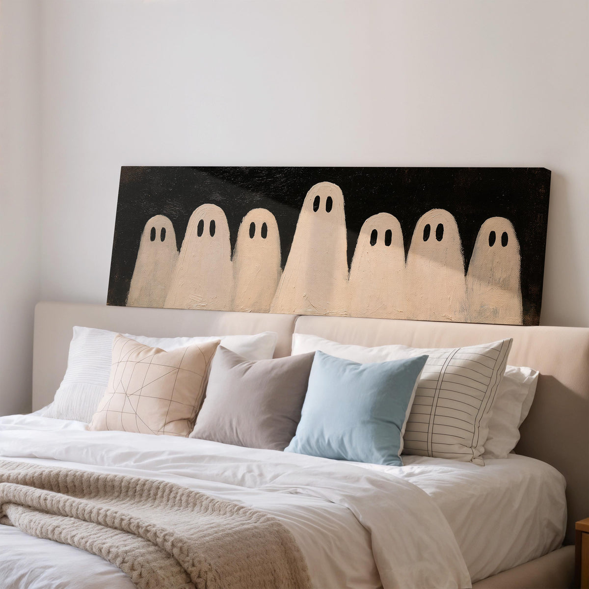 Friendly ghost gang wide panoramic canvas print above a bed in a bedroom