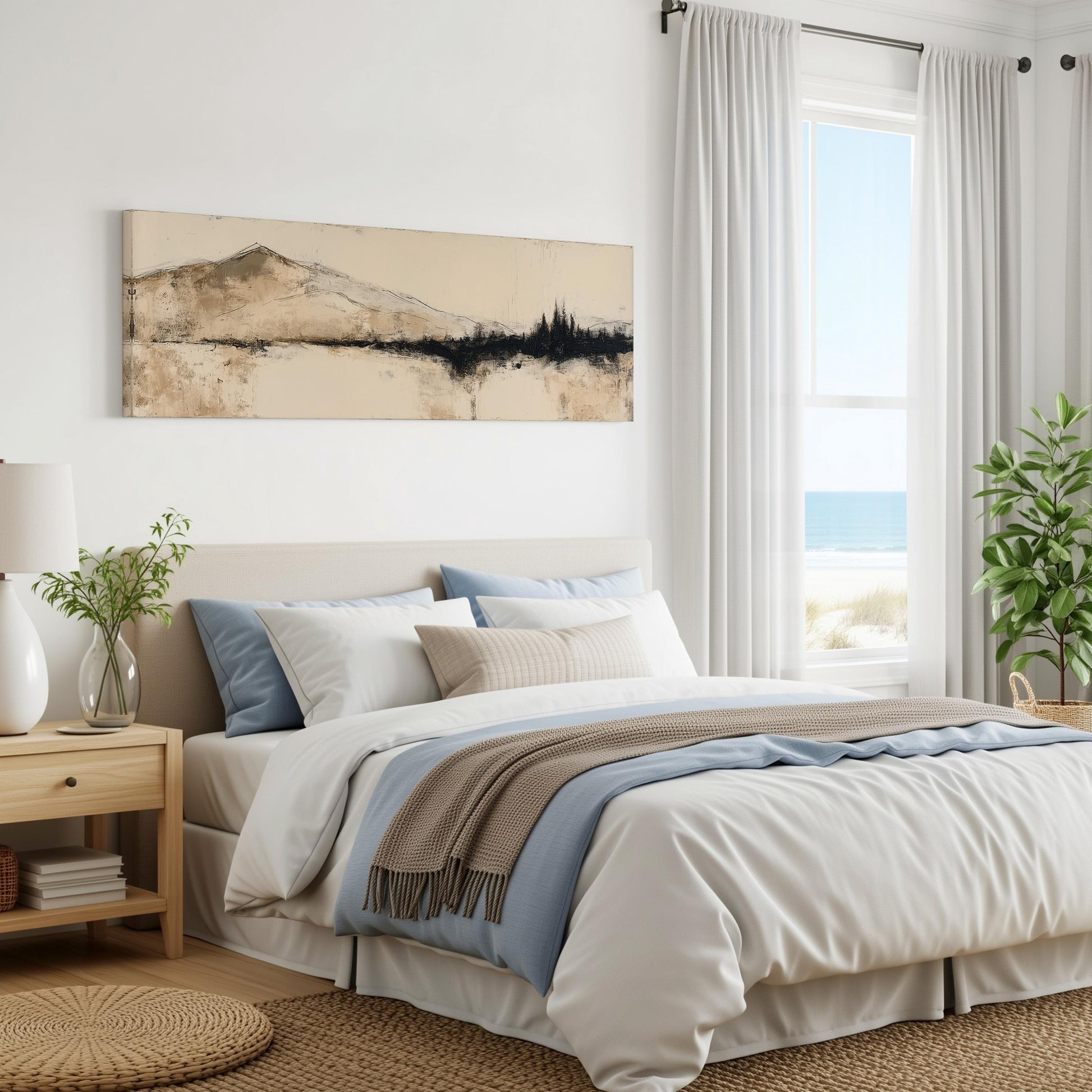 a serene and modern bedroom with a large bed, a nightstand, and a painting on the wall. The room has a beach view, as suggested by the presence of a window overlooking the ocean. The overall color scheme and decor create a calming and relaxing atmosphere.