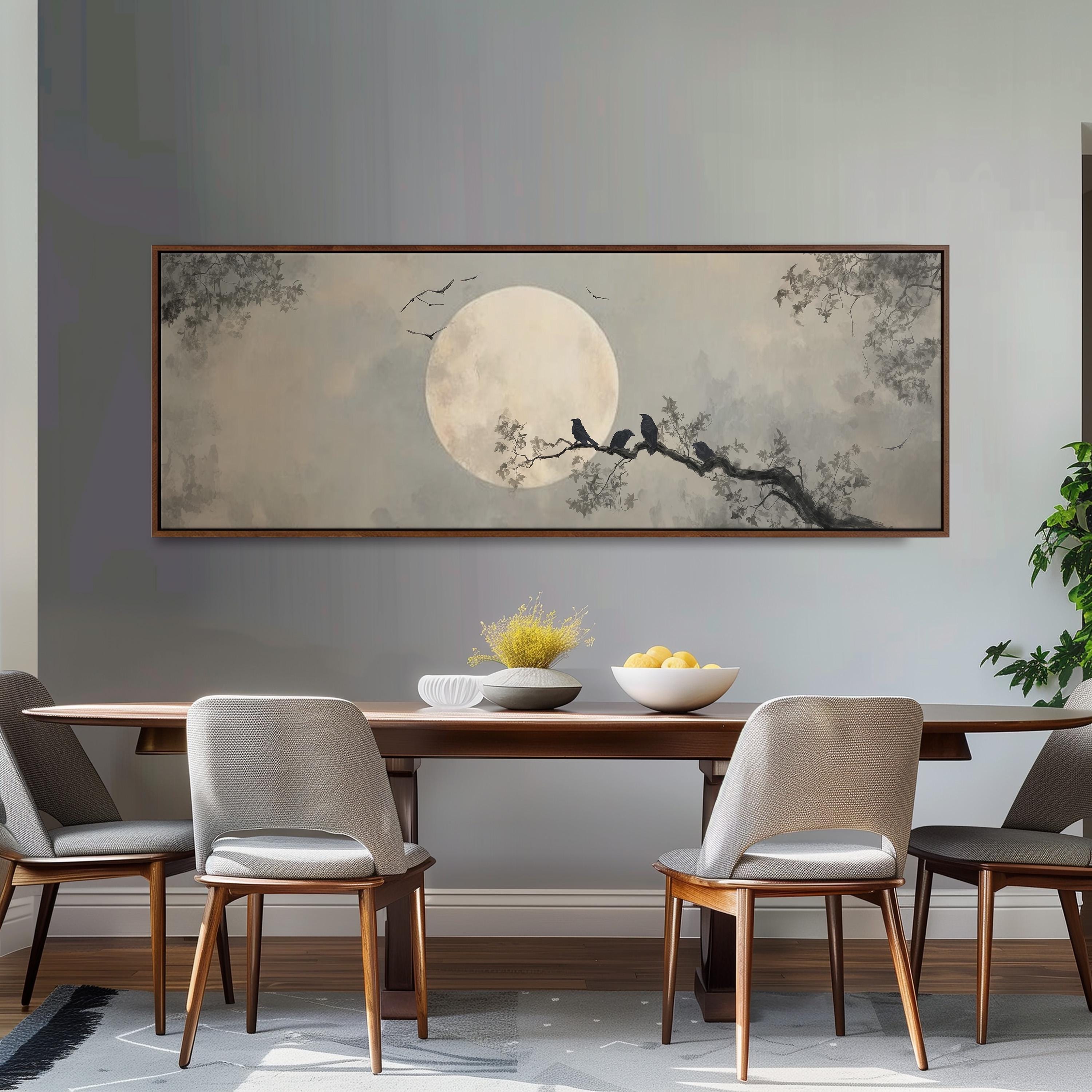 a dining room with a large painting of a moonlit night scene hanging on the wall above a wooden dining table with four chairs. The table is set with a bowl of fruit and a vase of flowers, creating a cozy and inviting atmosphere.