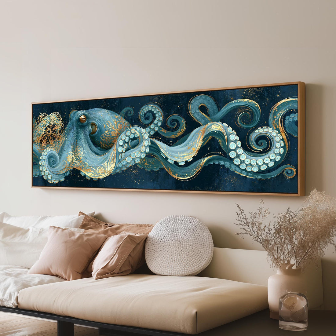 Blue and gold octopus long horizontal canvas print above a sofa in a living room