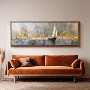 a large painting of a sailboat on a body of water, hanging on a wall above a brown sofa.