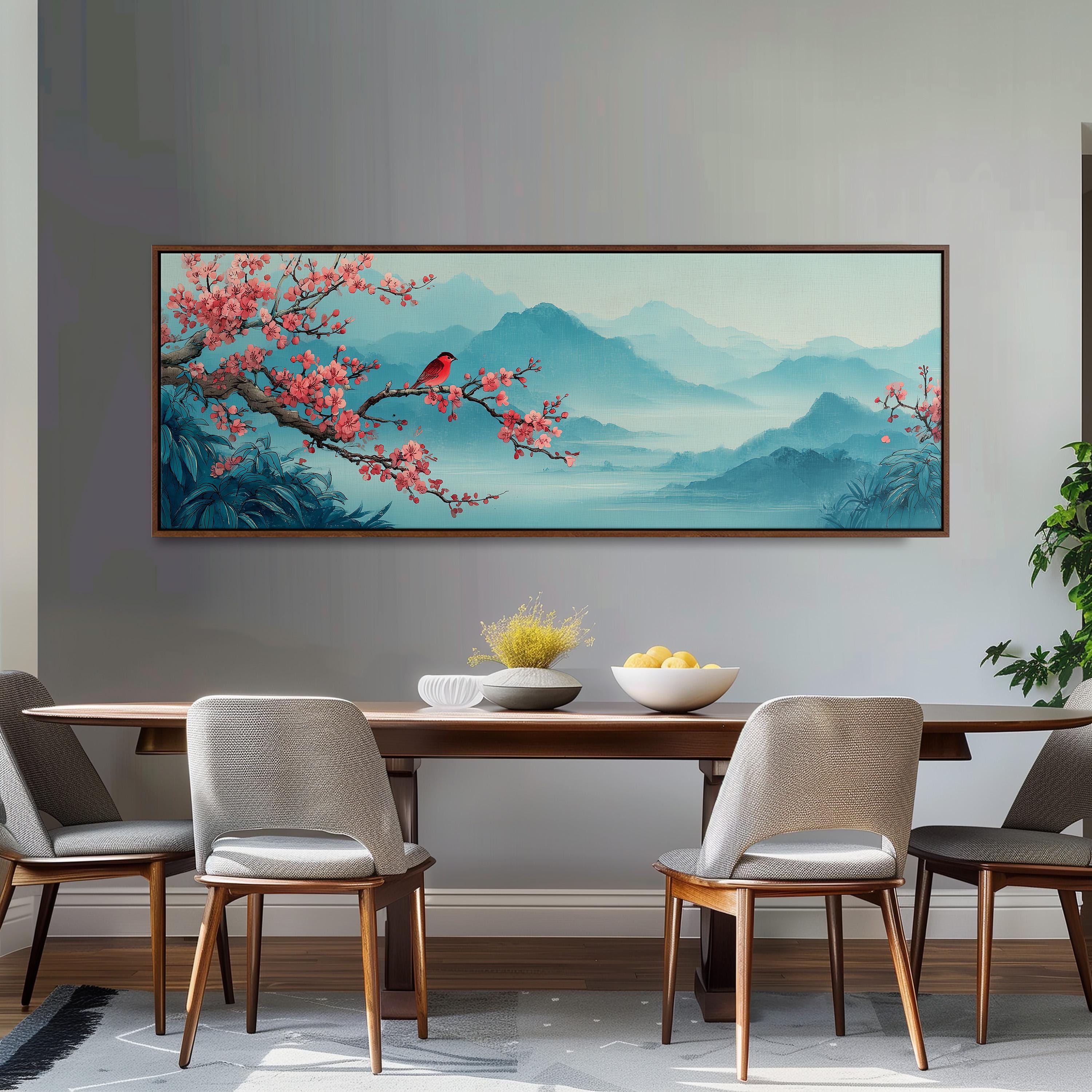a dining room with a large painting of a cherry blossom tree and mountains hanging on the wall above a wooden dining table with four chairs.