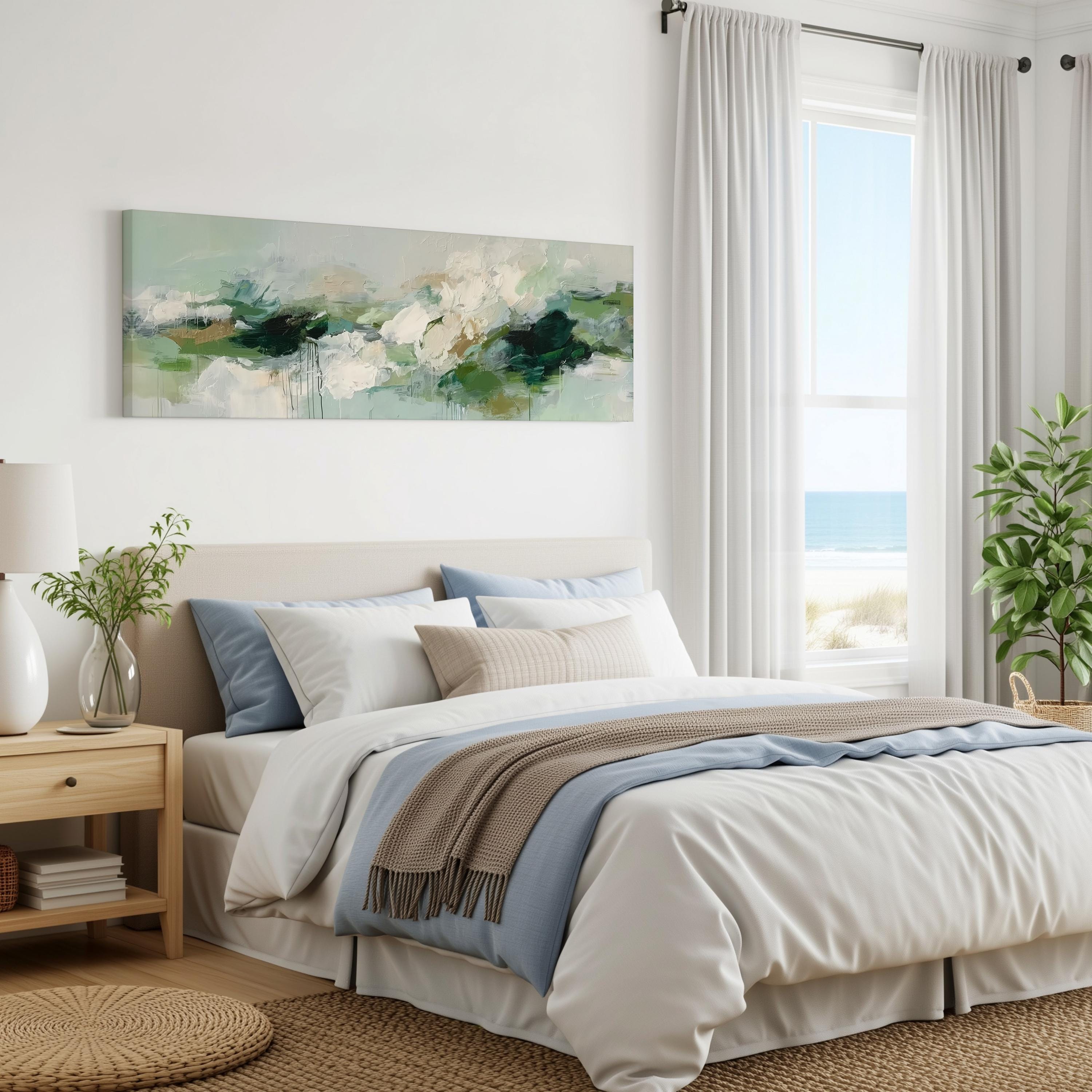 a serene and modern bedroom with a large bed, a painting on the wall, and a window overlooking the ocean.