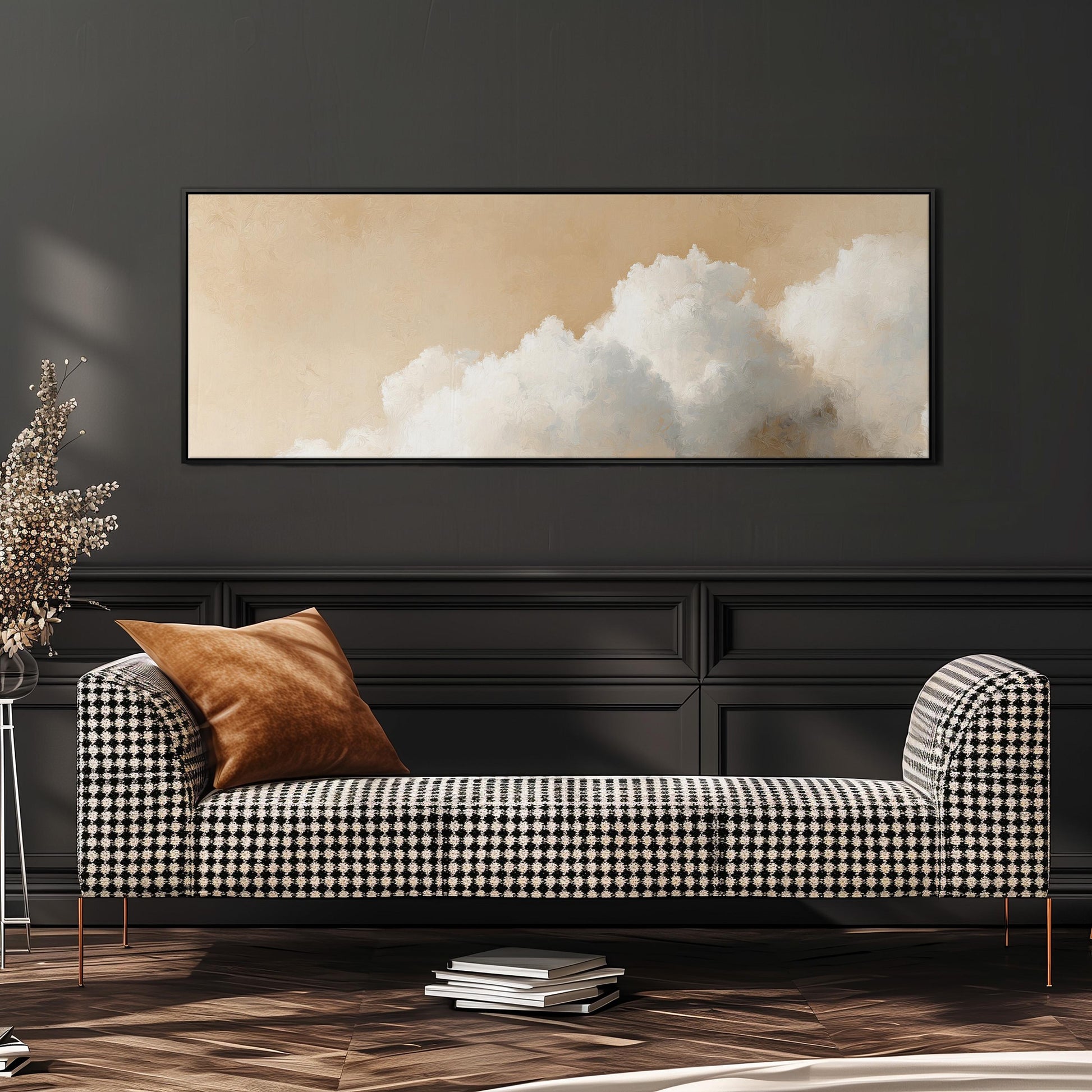 a black and white checkered sofa with a brown throw pillow, set against a dark wall with a framed picture of a cloud above it.