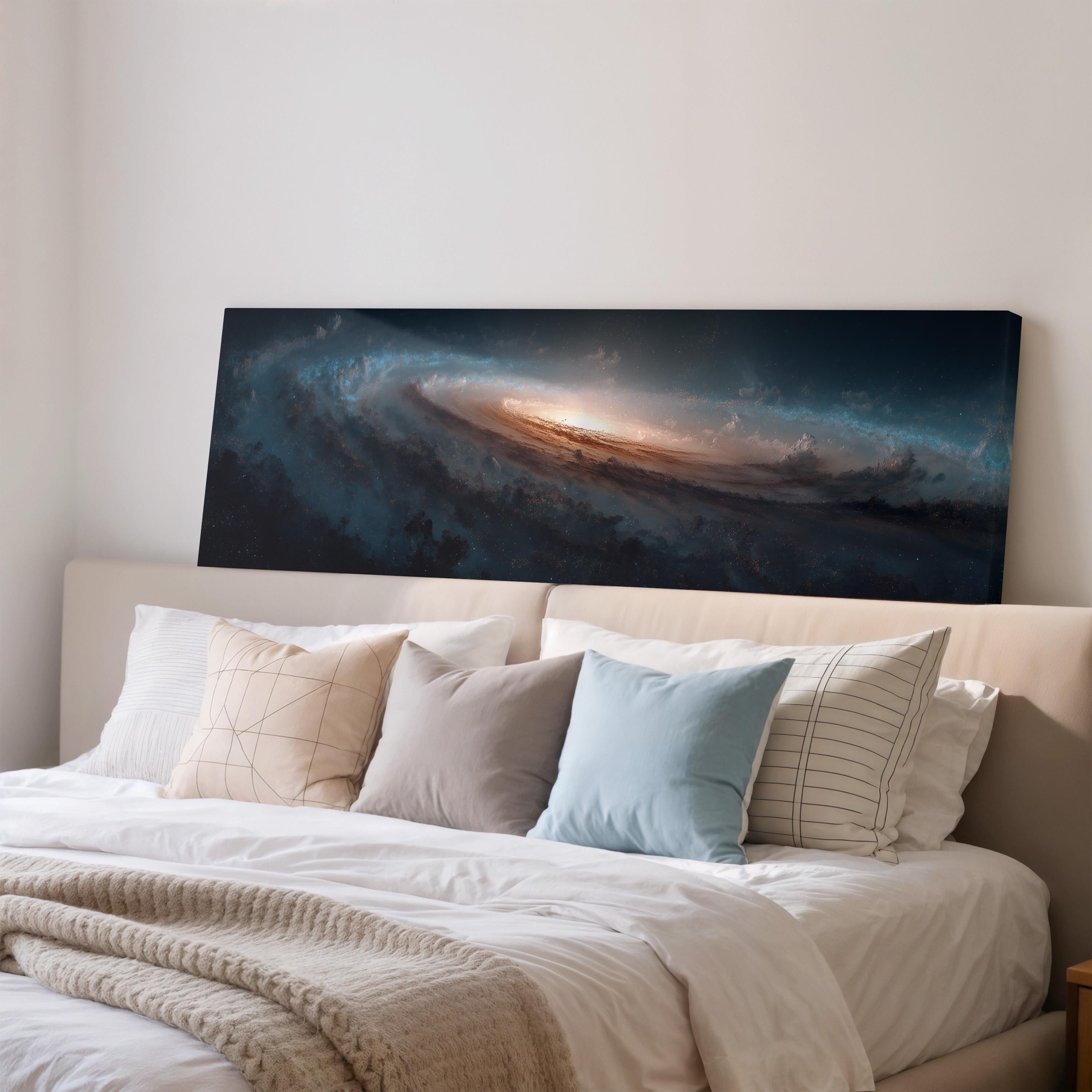 a large, dark-colored painting of a spiral galaxy hanging on a wall above a bed with white bedding and pillows.
