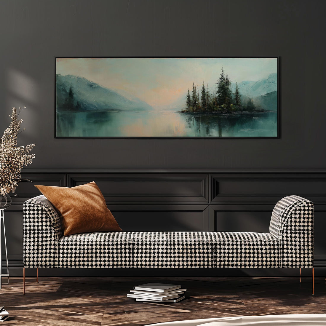 a large painting of a serene landscape with a lake and mountains in the background, hanging on a wall above a black and white checkered sofa.