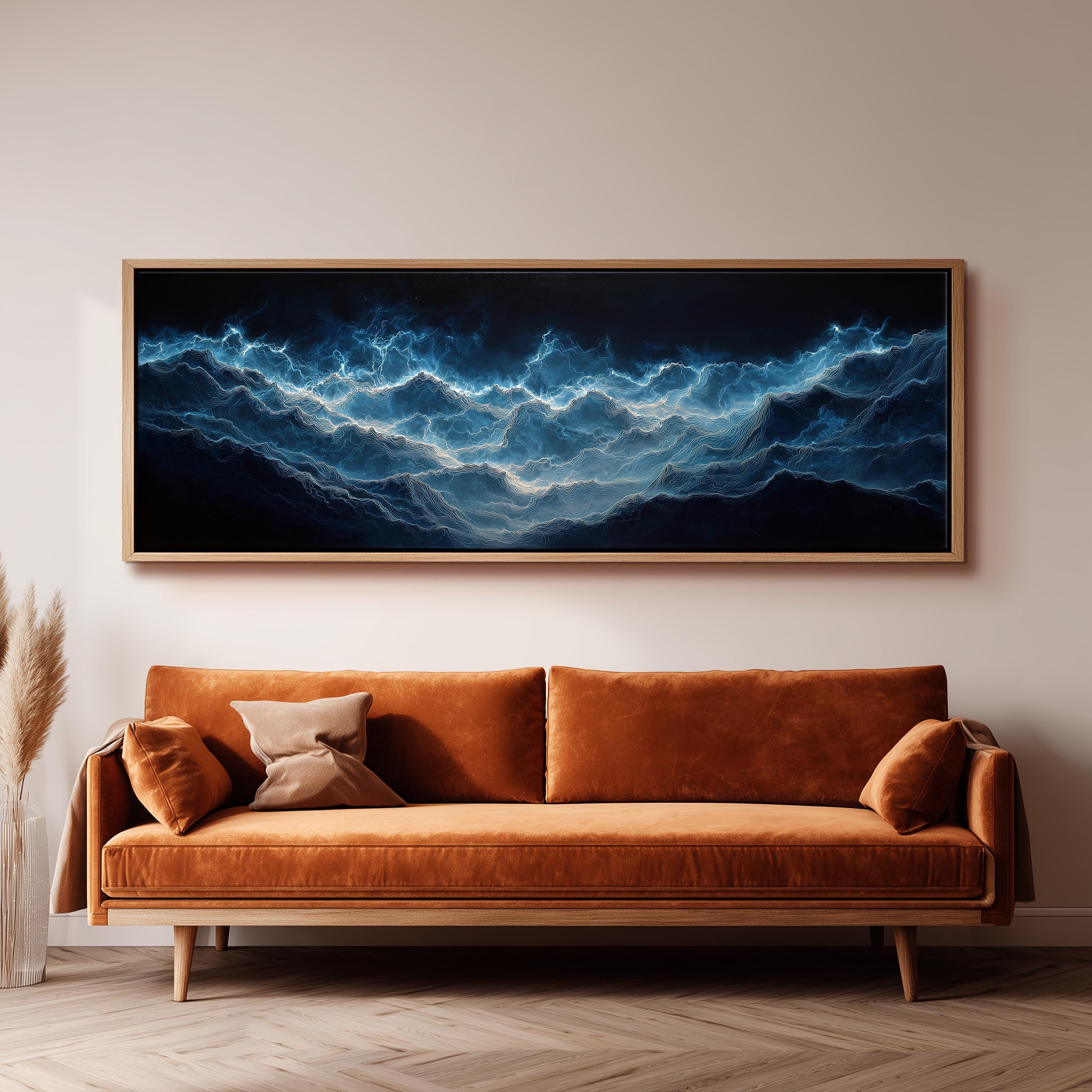 a large, framed painting of a stormy ocean scene hanging on a wall above a brown sofa.