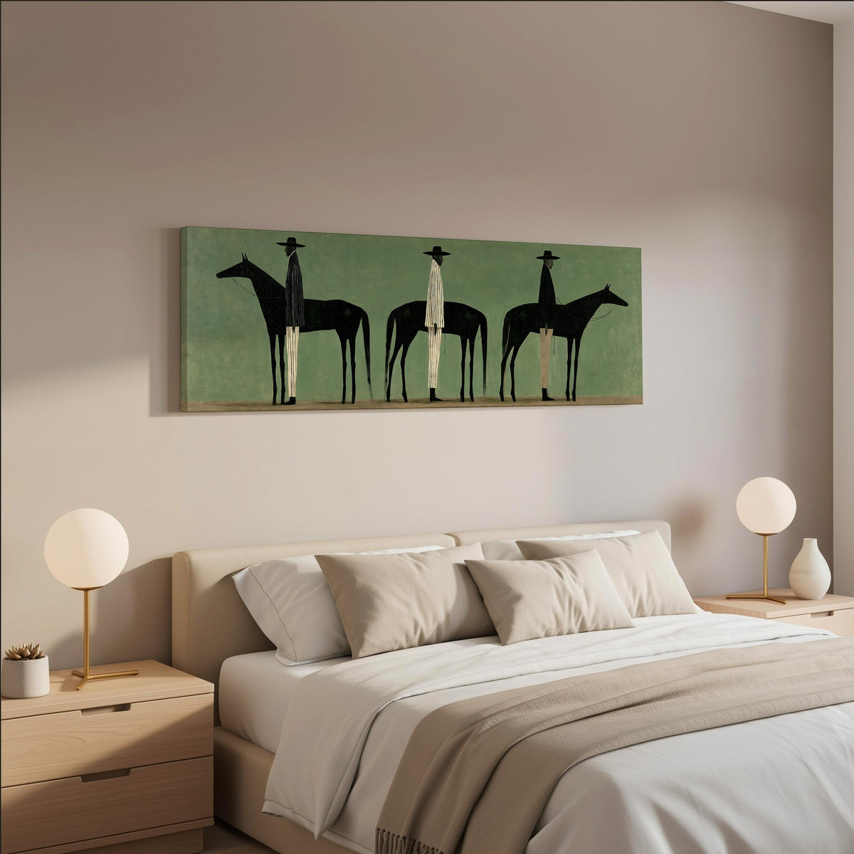 Three stylized cowboys with horses on sage green wide panoramic canvas print above a bed in a neutral bedroom