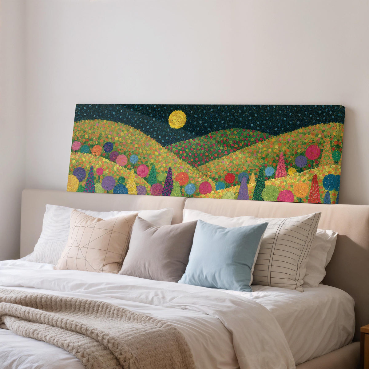 Moonlit pastel flower hills wide panoramic canvas print above a bed in a bedroom