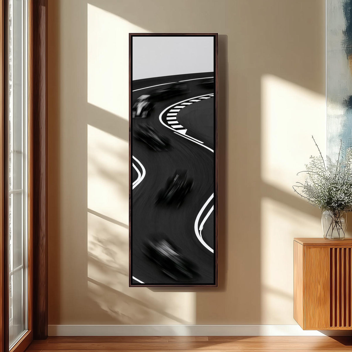 Race cars blurring around a curved track tall narrow canvas print beside a staircase in an entryway