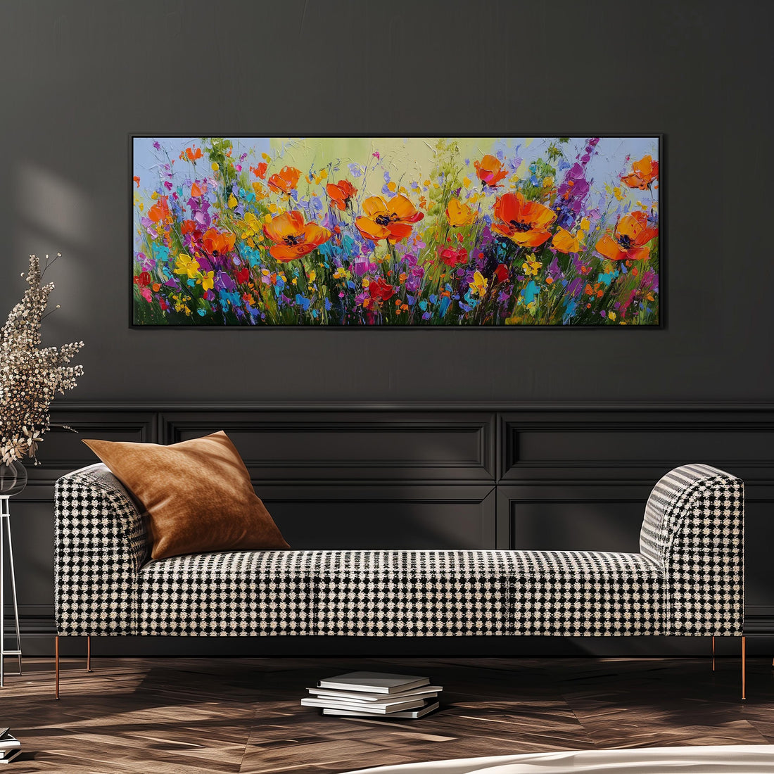 a large, vibrant painting of a field of flowers hanging on a wall above a brown sofa.