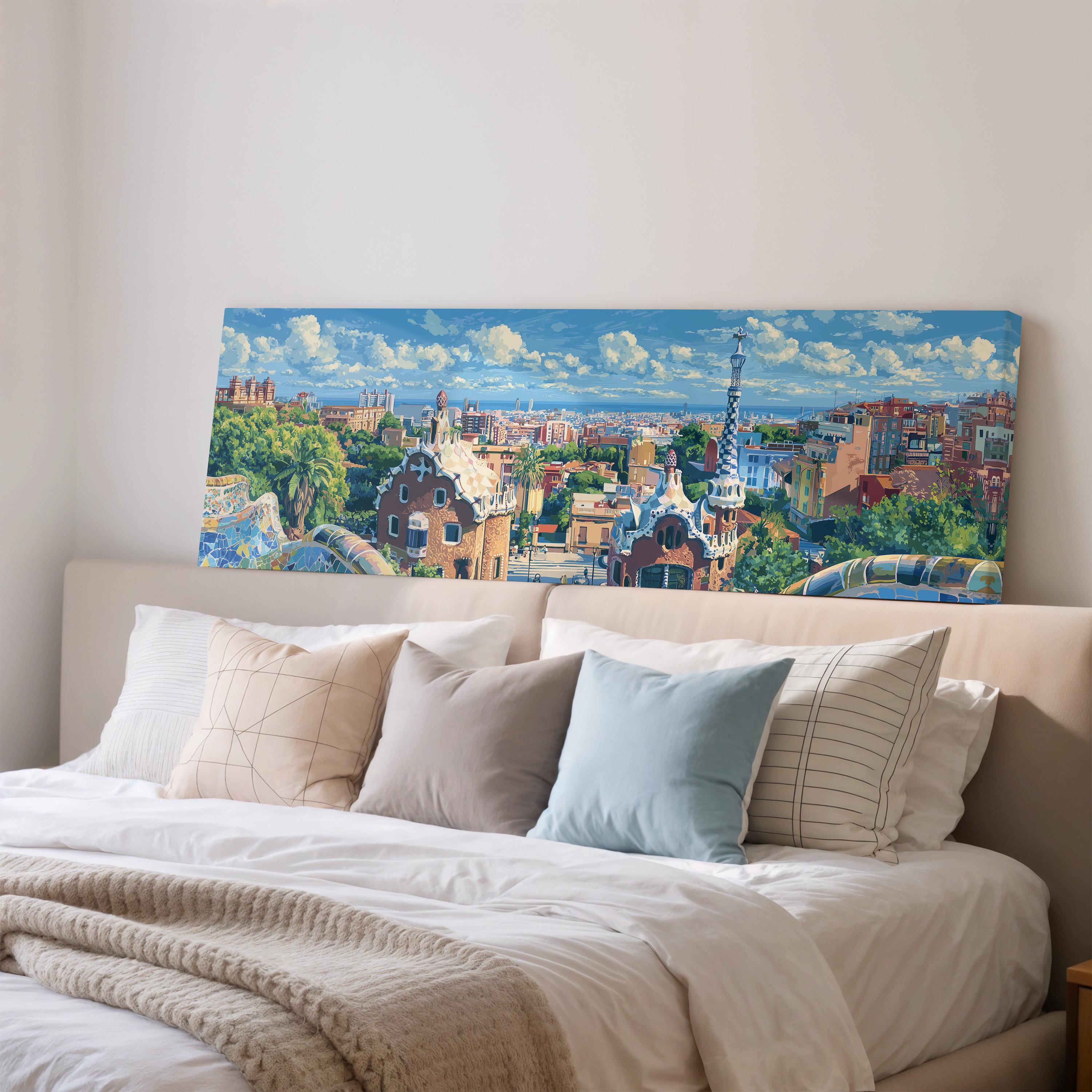 a large painting of a cityscape hanging on a wall above a bed with pillows.