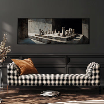 a black and white checkered sofa with a brown throw pillow, positioned in front of a large framed painting depicting a chessboard with chess pieces.