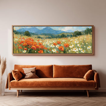 Alpine poppy and daisy meadow long horizontal canvas print above a sofa in a living room