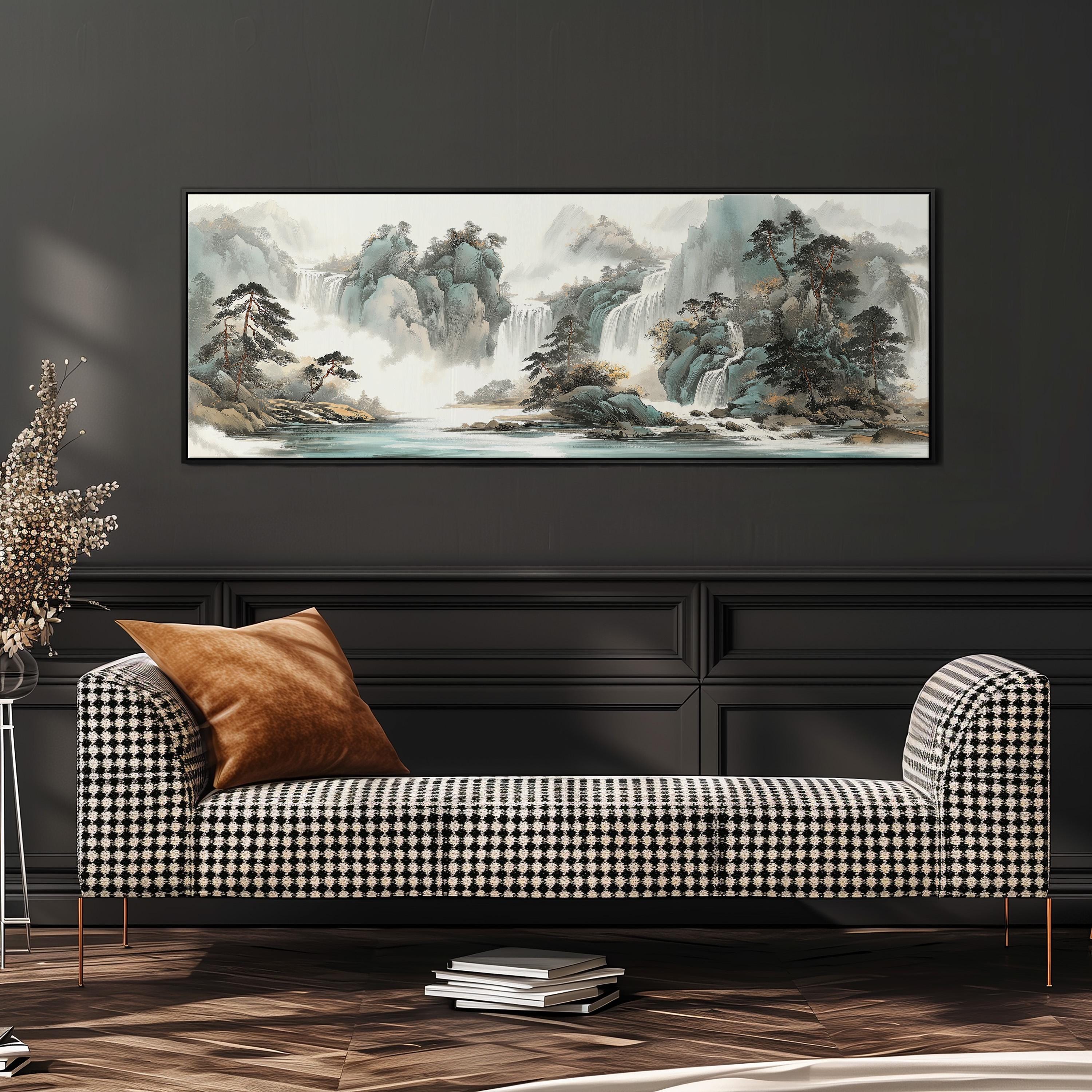 a large landscape painting hanging on a wall above a black and white checkered sofa with a brown throw pillow.