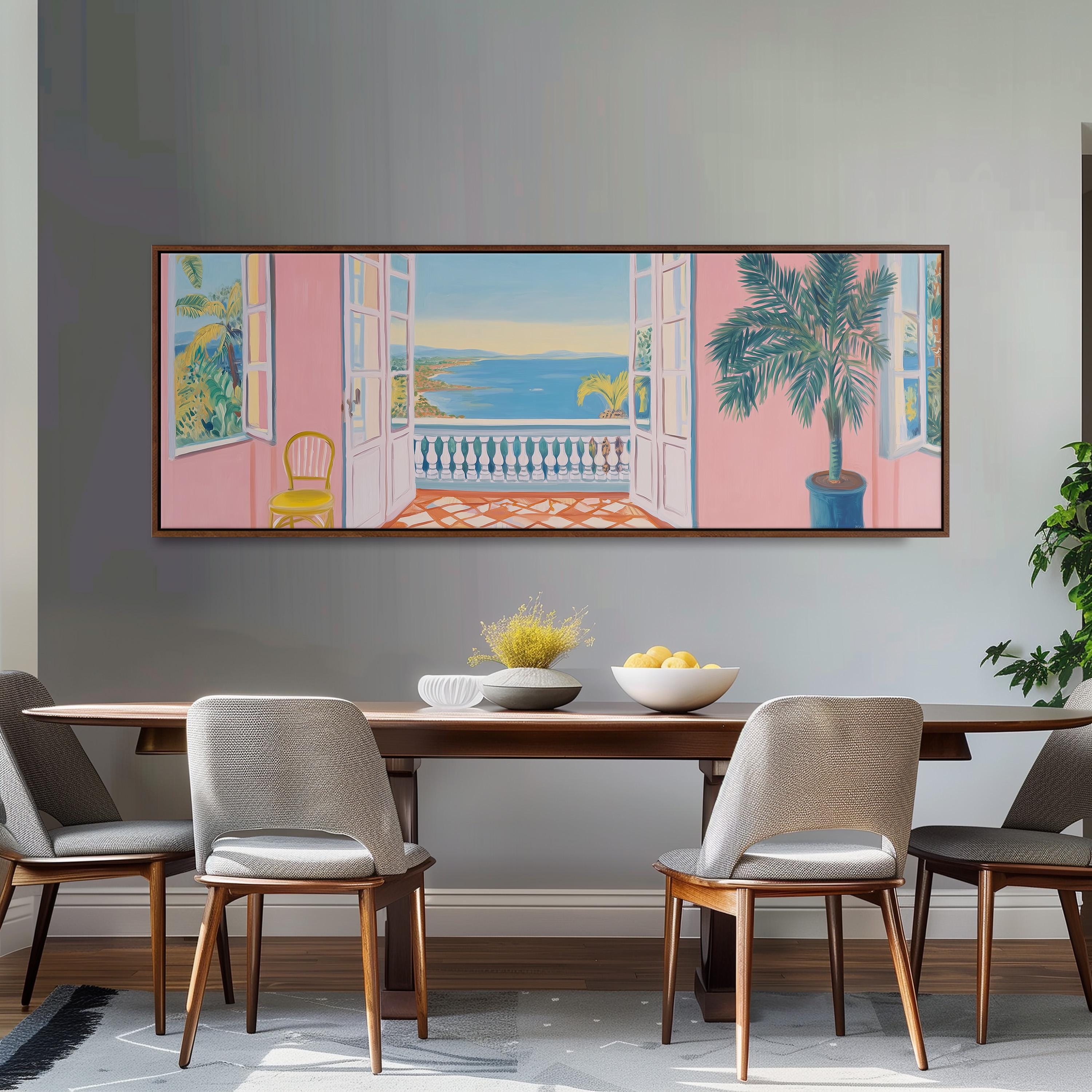 a dining room with a large painting of a balcony and a tropical scene hanging on the wall above a wooden dining table with four chairs.