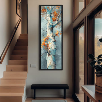 a large painting of a tree with vibrant orange leaves hanging on the wall of a hallway. The painting is framed and appears to be the focal point of the space.
