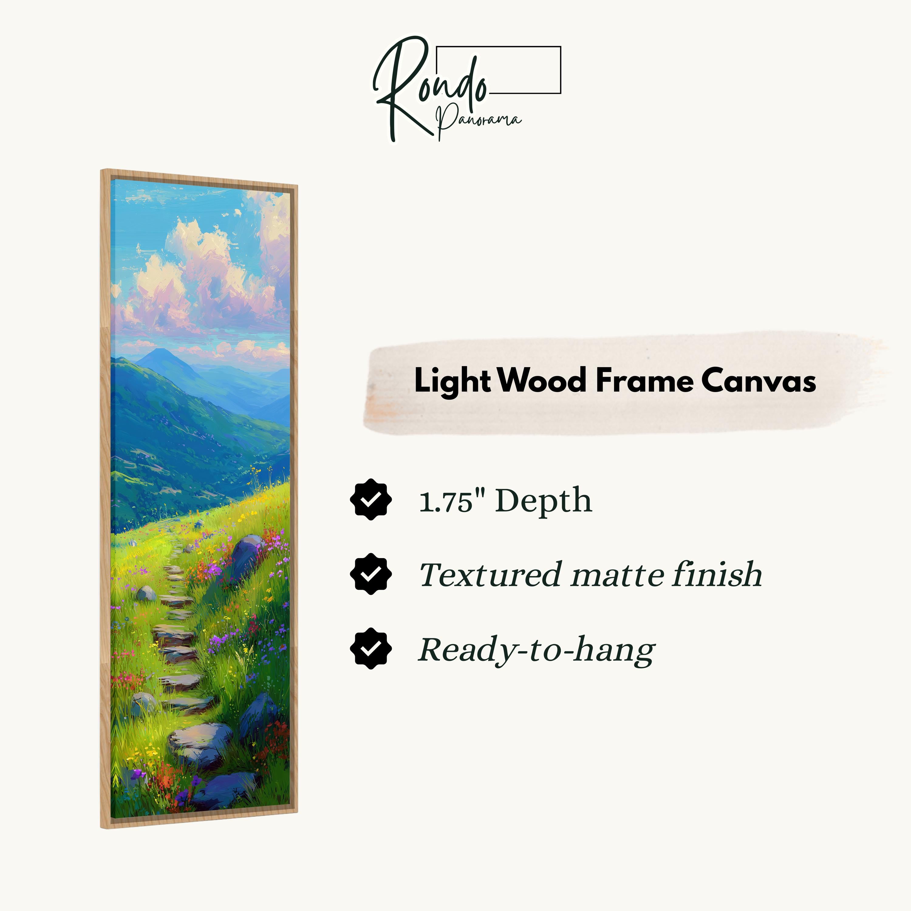The image is a light wood frame canvas depicting a scenic landscape with a winding path leading through a grassy field and mountains in the background.