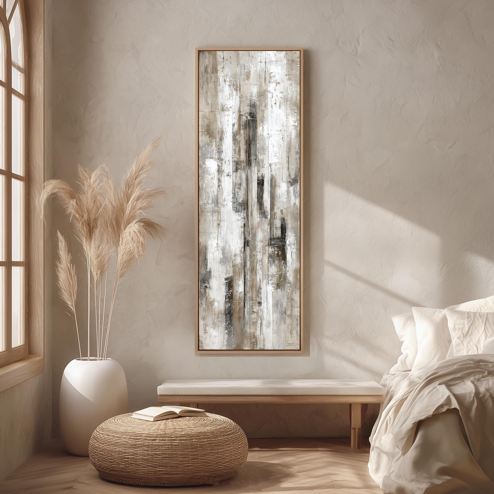 a serene and minimalist bedroom interior, featuring a large abstract painting on the wall, a white bed with a white pillow, a white wicker ottoman, and a tall potted plant with long, feathery branches.