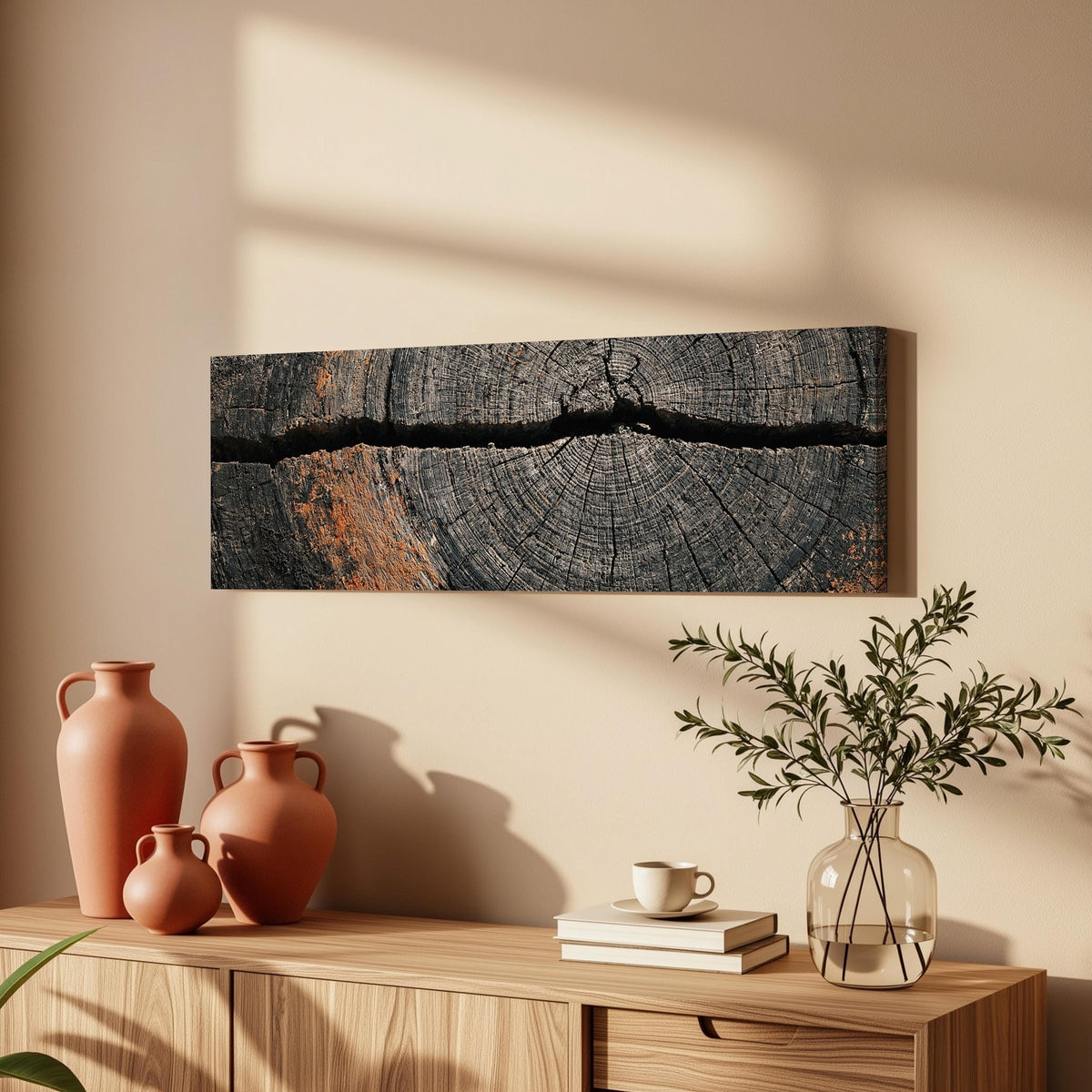 Cracked weathered wood ring long horizontal canvas print above a wooden sideboard