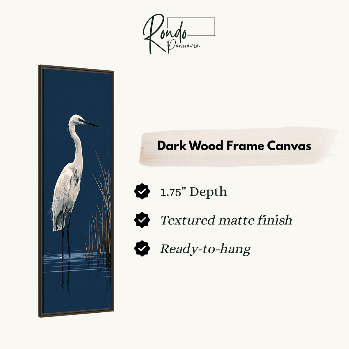 White egret wading on navy canvas print in a dark wood floating frame