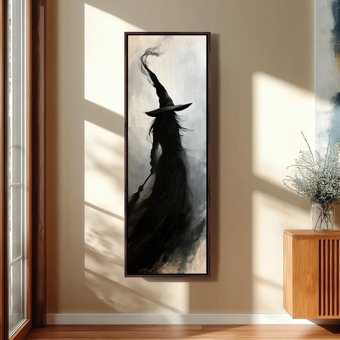 Witch silhouette with a tall hat in smoke long vertical canvas print in a sunlit living space